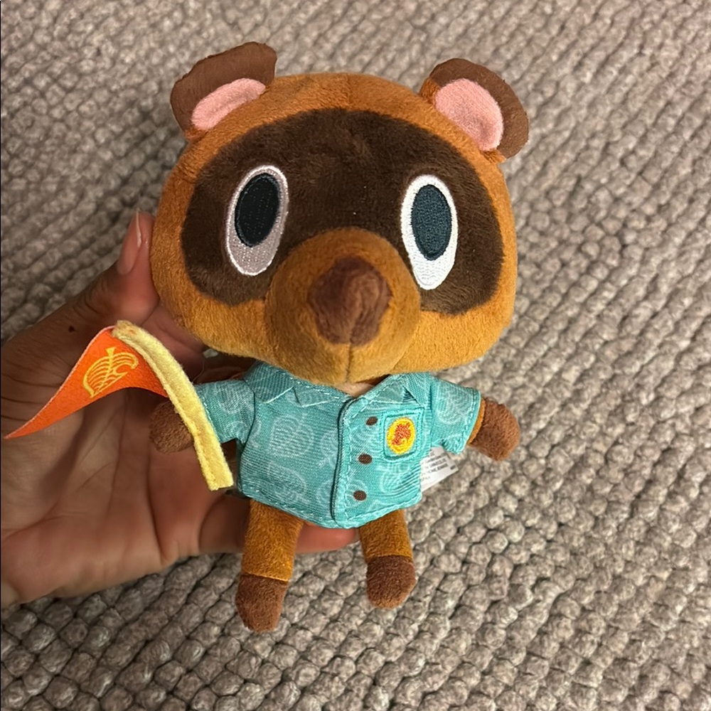 Charming Brown Raccoon Plush Toy with Blue Floral Shirt